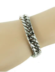 Mannequin hand wearing a silver bracelet on a white background